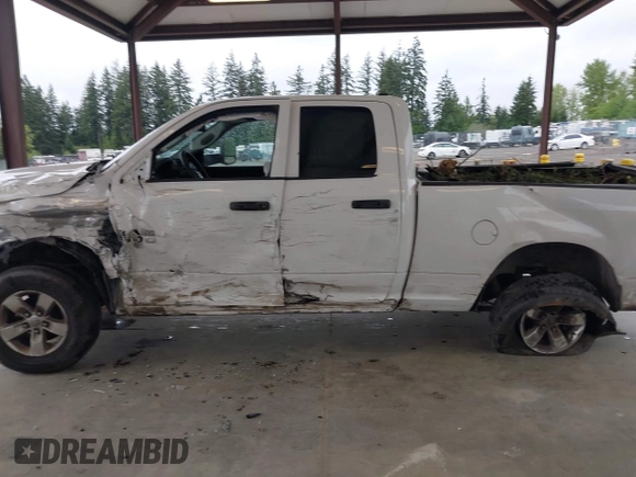2014 Ram 1500 Tradesman z VIN 1C6RR7FGXES305972, wystawiony jako IAAI lot #42149659 z przebiegiem 163 374 mil mil oraz . Historia ofert i sprzedaży dostępna na DreamBid. Obrazek 14.
