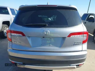 2020 Honda Pilot Touring 8-Passenger with VIN 5FNYF6H95LB021455, listed as a IAAI auction lot 41187609 with 35,589 mi miles and . Bid and sale history available at DreamBid. Image 16.