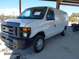 2014 Ford Econoline Cargo Commercial with VIN 1FTNE1EW1EDA66485, listed as a IAAI auction lot 41654271 with 304,974 mi miles and . Bid and sale history available at DreamBid. Image 2.