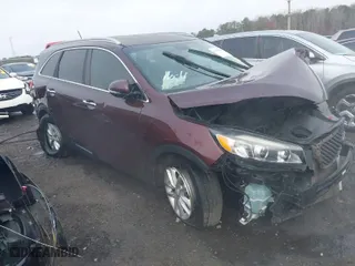 2016 Kia Sorento LX with VIN 5XYPG4A55GG142487, listed as a IAAI auction lot 41792925 with 118,355 mi miles. Bid and sale history available at carsss.com. Image 1.