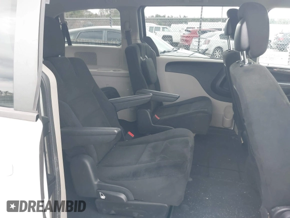 2015 Dodge Grand Caravan SE with VIN 2C4RDGBG2FR714404, listed as a IAAI auction lot 41860254 with 212,599 mi miles and . Bid and sale history available at DreamBid. Image 8.