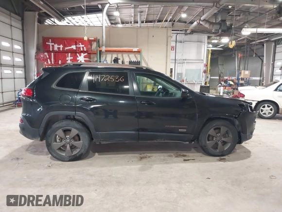 2016 Jeep Cherokee Latitude with VIN 1C4PJMCB5GW289738, listed as a IAAI auction lot 41472536 with 175,292 mi miles. Bid and sale history available at carsss.com. Image 14.