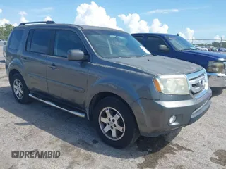 2011 Honda Pilot EX with VIN 5FNYF3H4XBB001140, listed as a IAAI auction lot 41940476 with 254,136 mi miles and . Bid and sale history available at carsss.com. Image 1.