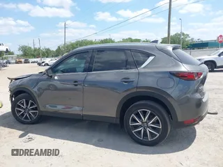 2017 Mazda CX-5 Grand Touring with VIN JM3KFADL3H0227655, listed as a IAAI auction lot 41897981 with 103,545 mi miles. Bid and sale history available at carsss.com. Image 14.