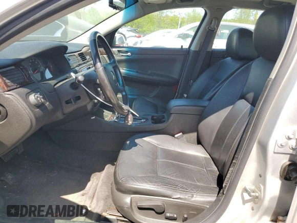 2012 Chevrolet Impala LTZ with VIN 2G1WC5E37C1291499, listed as a Copart auction lot 50063664 with 173,454 mi miles and Salvage Title. Bid and sale history available at DreamBid. Image 7.
