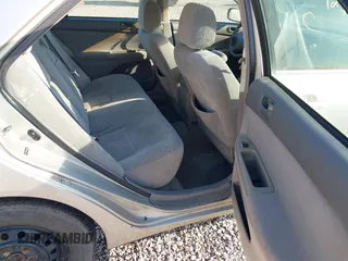 2004 Toyota Camry LE z VIN 4T1BE32K64U939657, wystawiony jako IAAI lot #42539274 z przebiegiem 271 429 mil mil oraz . Historia ofert i sprzedaży dostępna na DreamBid. Obrazek 8.