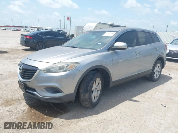 2013 Mazda CX-9 Touring with VIN JM3TB2CA8D0405365, listed as a IAAI auction lot 42551186 with 204,868 mi miles and . Bid and sale history available at DreamBid. Image 2.