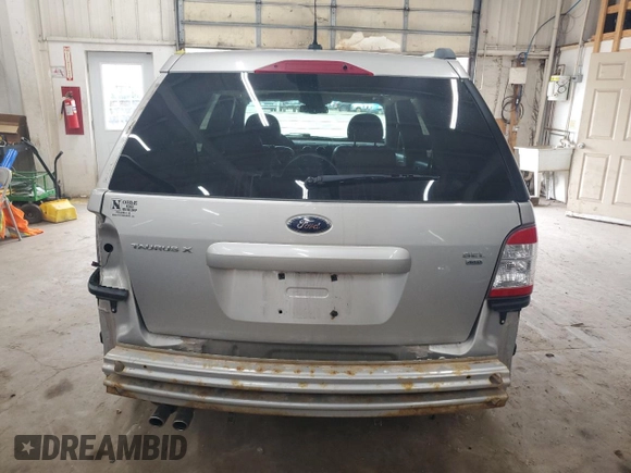 2008 Ford Taurus X SEL с VIN 1FMDK05W88GA38972, выставлен на аукционе Copart как лот 58008955 с пробегом 152 696 миль миль и Списание • Salvage title. История ставок и продаж доступна на DreamBid. Изображение 6.