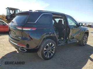 2023 Jeep Grand Cherokee Overland z VIN 1C4RJHDG4PC516719, wystawiony jako Copart lot #73334034 z przebiegiem 6 306 mil mil oraz Szkoda całkowita • Salvage title. Historia ofert i sprzedaży dostępna na DreamBid. Obrazek 3.