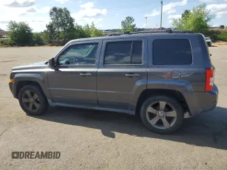 2014 Jeep Patriot Latitude with VIN 1C4NJPFA1ED812807, listed as a Copart auction lot 55102965 with 119,949 mi miles and Clean Title. Bid and sale history available at carsss.com. Image 2.