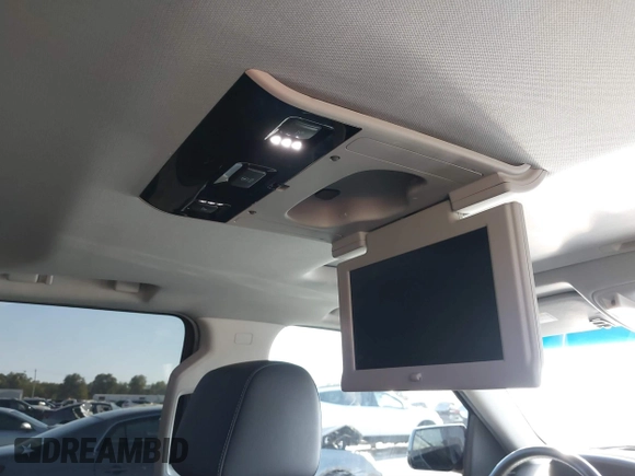 2019 Chevrolet Suburban Premier with VIN 1GNSKJKJ1KR100936, listed as a IAAI auction lot 40489121 with 97,884 mi miles and . Bid and sale history available at DreamBid. Image 22.