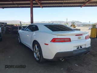 2014 Chevrolet Camaro LT z VIN 2G1FB1E32E9315353, wystawiony jako IAAI lot #42465033 z przebiegiem 103 863 mil mil oraz . Historia ofert i sprzedaży dostępna na DreamBid. Obrazek 3.