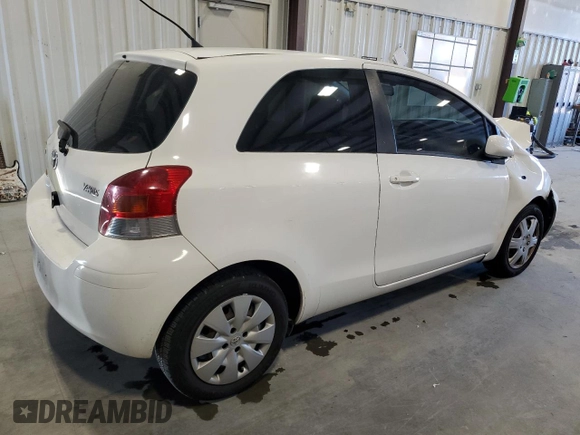 2011 Toyota Yaris with VIN JTDJT4K30B5334173, listed as a Copart auction lot 87031624 with 179,280 mi miles and Salvage Title. Bid and sale history available at carsss.com. Image 3.