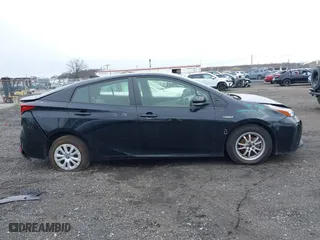 2022 Toyota Prius L Eco with VIN JTDKAMFUXN3174204, listed as a IAAI auction lot 41747089 with 79,531 mi miles. Bid and sale history available at carsss.com. Image 13.