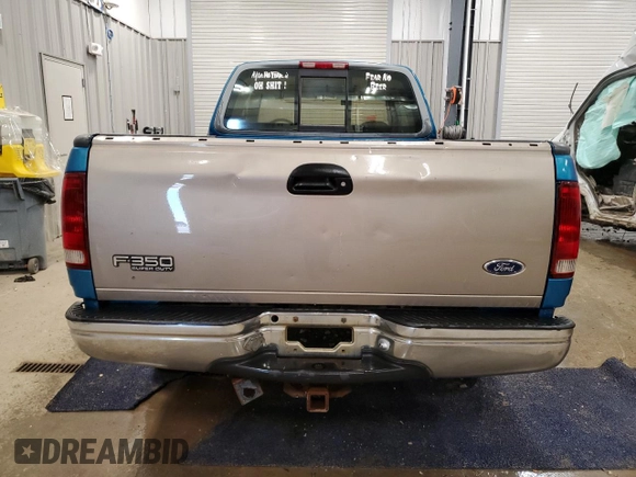 1997 Ford F-150 XL with VIN 1FTDX186XVKC03985, listed as a Copart auction lot 52808035 with 274,590 mi miles and Clean title. Bid and sale history available at DreamBid. Image 6.