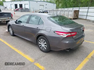 2019 Toyota Camry Hybrid LE z VIN 4T1B31HK4KU511360, wystawiony jako IAAI lot #42298260 z przebiegiem 133 019 mil mil oraz . Historia ofert i sprzedaży dostępna na DreamBid. Obrazek 3.