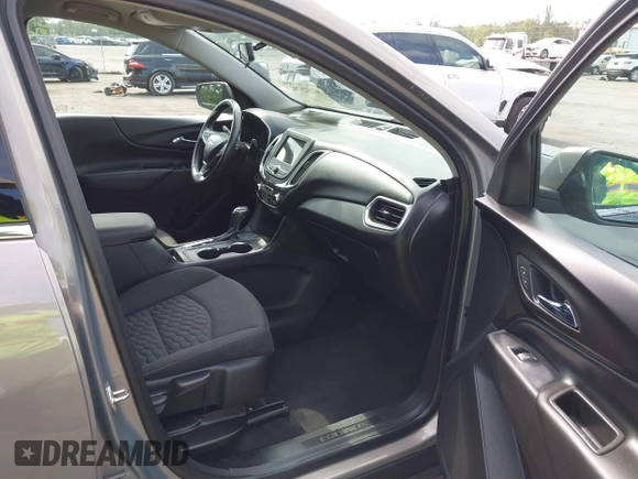 2019 Chevrolet Equinox LT z VIN 3GNAXKEVXKS586516, wystawiony jako IAAI lot #42323792 z przebiegiem 53 710 mil mil oraz . Historia ofert i sprzedaży dostępna na DreamBid. Obrazek 5.
