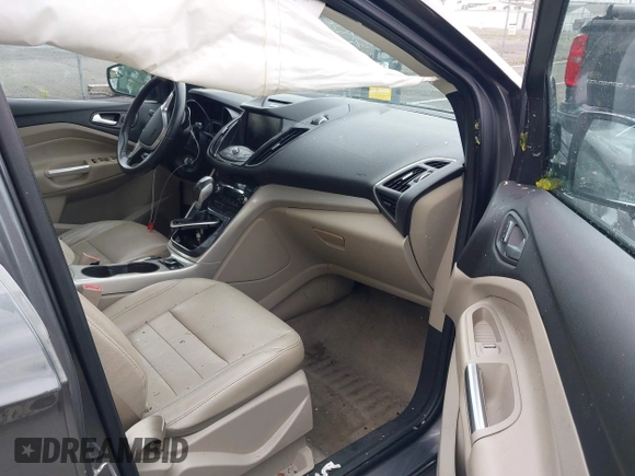 2013 Ford Escape SEL z VIN 1FMCU9H96DUC66206, wystawiony jako IAAI lot #42376442 z przebiegiem 96 776 mil mil oraz . Historia ofert i sprzedaży dostępna na DreamBid. Obrazek 5.