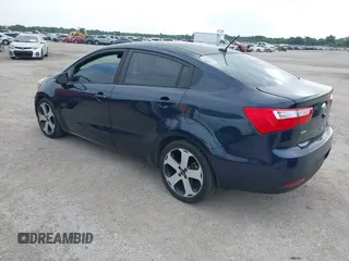 2013 Kia Rio EX with VIN KNADN4A39D6271075, listed as a IAAI auction lot 42684197 with 136,099 mi miles and . Bid and sale history available at DreamBid. Image 3.