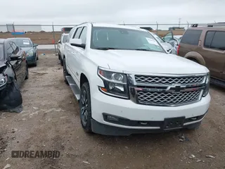 2017 Chevrolet Suburban LT z VIN 1GNSCHKC3HR333409, wystawiony jako IAAI lot #42201558 z przebiegiem 130 394 mil mil oraz . Historia ofert i sprzedaży dostępna na DreamBid. Obrazek 1.