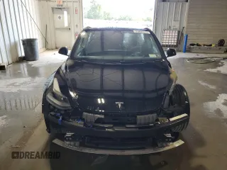 2023 Tesla Model 3 z VIN 5YJ3E1EA1PF450693, wystawiony jako Copart lot #63134005 z przebiegiem 65 116 mil mil oraz Czysty tytuł • Clean title. Historia ofert i sprzedaży dostępna na DreamBid. Obrazek 5.
