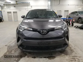2019 Toyota C-HR XLE with VIN JTNKHMBX0K1035830, listed as a Copart auction lot 52561095 with 98,412 mi miles and Clean Title. Bid and sale history available at carsss.com. Image 5.