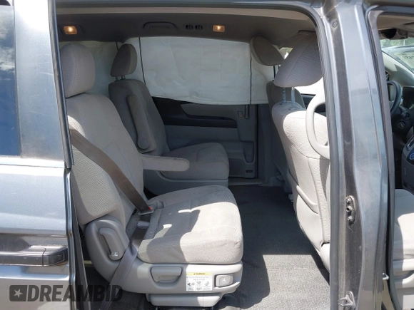 2012 Honda Odyssey LX с VIN 5FNRL5H23CB049703, выставлен на аукционе IAAI как лот 42467459 с пробегом 96 247 миль миль и . История ставок и продаж доступна на DreamBid. Изображение 8.