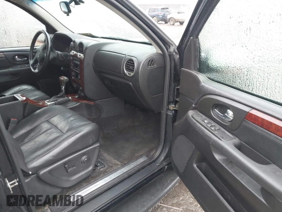 2005 GMC Envoy XL SLE with VIN 1GKET16S156160473, listed as a IAAI auction lot 41510661 with 233,942 mi miles. Bid and sale history available at carsss.com. Image 5.