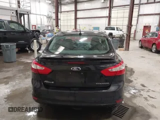 2014 Ford Focus Titanium with VIN 1FADP3J22EL199563, listed as a IAAI auction lot 41450106 with 129,271 mi miles. Bid and sale history available at carsss.com. Image 16.