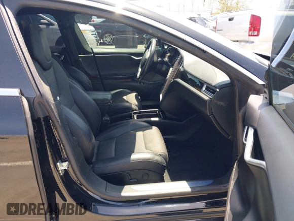 2017 Tesla Model S 60 with VIN 5YJSA1E17HF232699, listed as a IAAI auction lot 42327539 with 113,923 mi miles and . Bid and sale history available at DreamBid. Image 5.