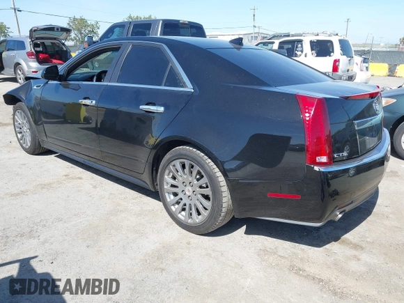 2012 Cadillac CTS Performance z VIN 1G6DJ5E30C0156576, wystawiony jako IAAI lot #42287858 z przebiegiem 106 497 mil mil oraz . Historia ofert i sprzedaży dostępna na DreamBid. Obrazek 3.