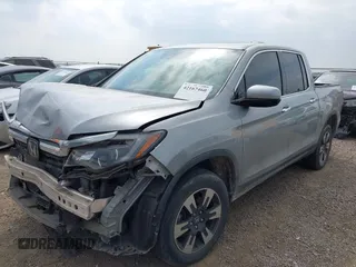 2019 Honda Ridgeline RTL-E with VIN 5FPYK3F73KB006244, listed as a IAAI auction lot 42167460 with 53,498 mi miles and . Bid and sale history available at DreamBid. Image 2.