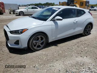 2019 Hyundai Veloster 2.0 с VIN KMHTG6AF2KU019977, выставлен на аукционе Copart как лот 62178965 с пробегом 83 621 миль миль и Списание • Salvage title. История ставок и продаж доступна на DreamBid. Изображение 1.