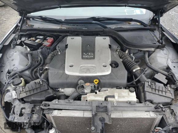 2015 Infiniti Q60 S Limited with VIN JN1CV6EKXFM870046, listed as a Copart auction lot 60286085 with 99,319 mi miles and Salvage title. Bid and sale history available at DreamBid. Image 11.