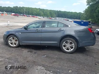 2017 Ford Taurus SEL with VIN 1FAHP2E82HG132551, listed as a IAAI auction lot 42633317 with 80,785 mi miles and . Bid and sale history available at DreamBid. Image 14.