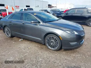 2016 Lincoln MKZ z VIN 3LN6L2G90GR602209, wystawiony jako IAAI lot #42096366 z przebiegiem 78 234 mil mil oraz . Historia ofert i sprzedaży dostępna na DreamBid. Obrazek 1.