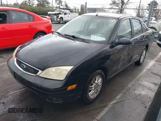 2005 Ford Focus S with VIN 1FAFP34N75W304479, listed as a IAAI auction lot 41117405 with 234,312 mi miles. Bid and sale history available at carsss.com. Image 2.