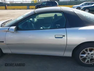 2002 Chevrolet Camaro Z28 z VIN 2G1FP22G722167574, wystawiony jako IAAI lot #41976510 z przebiegiem 114 863 mil mil oraz . Historia ofert i sprzedaży dostępna na DreamBid. Obrazek 14.