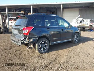 2015 Subaru Forester 2.0XT Touring with VIN JF2SJGUC0FH516972, listed as a IAAI auction lot 41483033 with 103,970 mi miles. Bid and sale history available at carsss.com. Image 4.