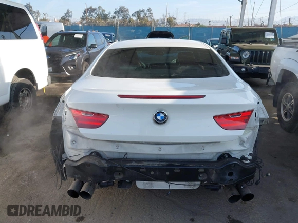 2012 BMW 6 Series 650i with VIN WBALX3C52CC528401, listed as a IAAI auction lot 42046910 with 105,844 mi miles. Bid and sale history available at carsss.com. Image 17.