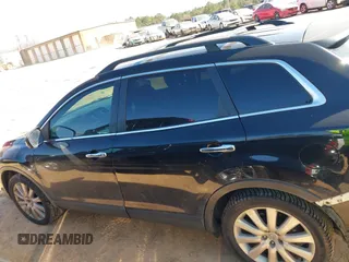 2010 Mazda CX-9 Grand Touring z VIN JM3TB3MV1A0208623, wystawiony jako IAAI lot #41668500 z przebiegiem 226 233 mil mil oraz . Historia ofert i sprzedaży dostępna na DreamBid. Obrazek 14.