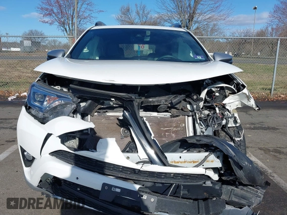 2017 Toyota RAV4 SE with VIN 2T3JFREV7HW668686, listed as a IAAI auction lot 41832458 with 66,159 mi miles and . Bid and sale history available at DreamBid. Image 12.