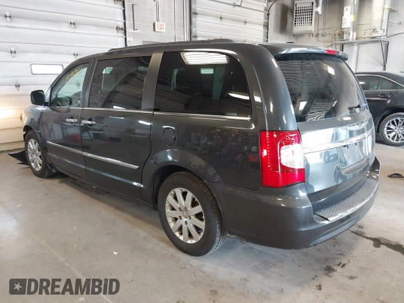 2011 Chrysler Town & Country Touring L z VIN 2A4RR8DG6BR798395, wystawiony jako IAAI lot #41084235 z przebiegiem 129 778 mil mil oraz . Historia ofert i sprzedaży dostępna na DreamBid. Obrazek 3.