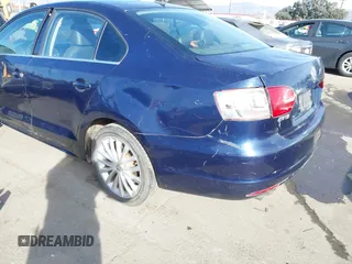 2014 Volkswagen Jetta TDI w/Premium with VIN 3VW3L7AJ7EM367323, listed as a IAAI auction lot 41419079 with 166,511 mi miles and . Bid and sale history available at DreamBid. Image 6.