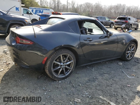 2021 Mazda MX-5 Miata Grand Touring with VIN JM1NDAM71M0451354, listed as a Copart auction lot 47756025 with 53,347 mi miles and Salvage title. Bid and sale history available at DreamBid. Image 3.