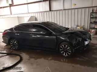 2018 Nissan Altima 2.5 SV with VIN 1N4AL3AP1JC276024, listed as a IAAI auction lot 41271383 with 121,088 mi miles. Bid and sale history available at carsss.com. Image 14.