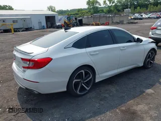 2021 Honda Accord Sport with VIN 1HGCV2F38MA027279, listed as a IAAI auction lot 42452235 with 58,180 mi miles and . Bid and sale history available at DreamBid. Image 4.