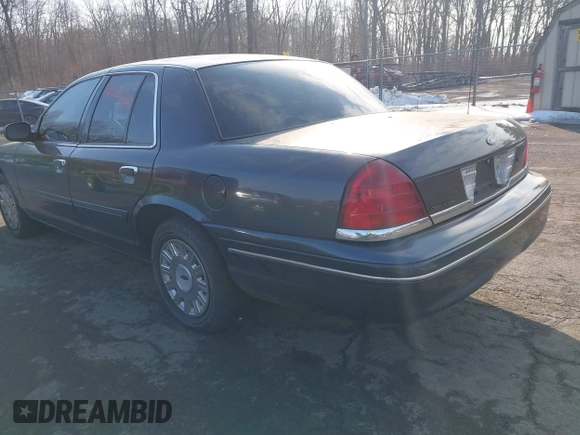 2005 Ford Police Interceptor z VIN 2FAHP71W95X170821, wystawiony jako IAAI lot #41538727 z przebiegiem 115 722 mil mil oraz . Historia ofert i sprzedaży dostępna na DreamBid. Obrazek 3.