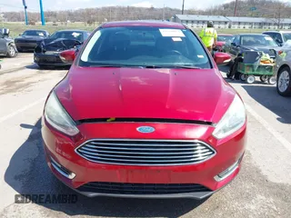 2015 Ford Focus Titanium with VIN 1FADP3J29FL230664, listed as a IAAI auction lot 41870083 with 125,578 mi miles and . Bid and sale history available at DreamBid. Image 12.