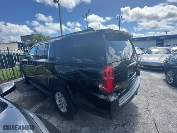 2018 Chevrolet Suburban LS with VIN 1GNSCGKC7JR316242, listed as a Copart auction lot 74991054 with 239,667 mi miles and Clean Title. Bid and sale history available at carsss.com. Image 3.